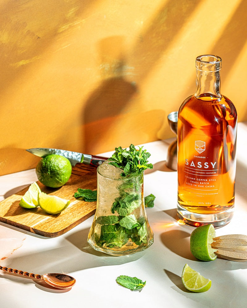 Minty and citrus calvados cocktail being created with Maison Sassy calvados
